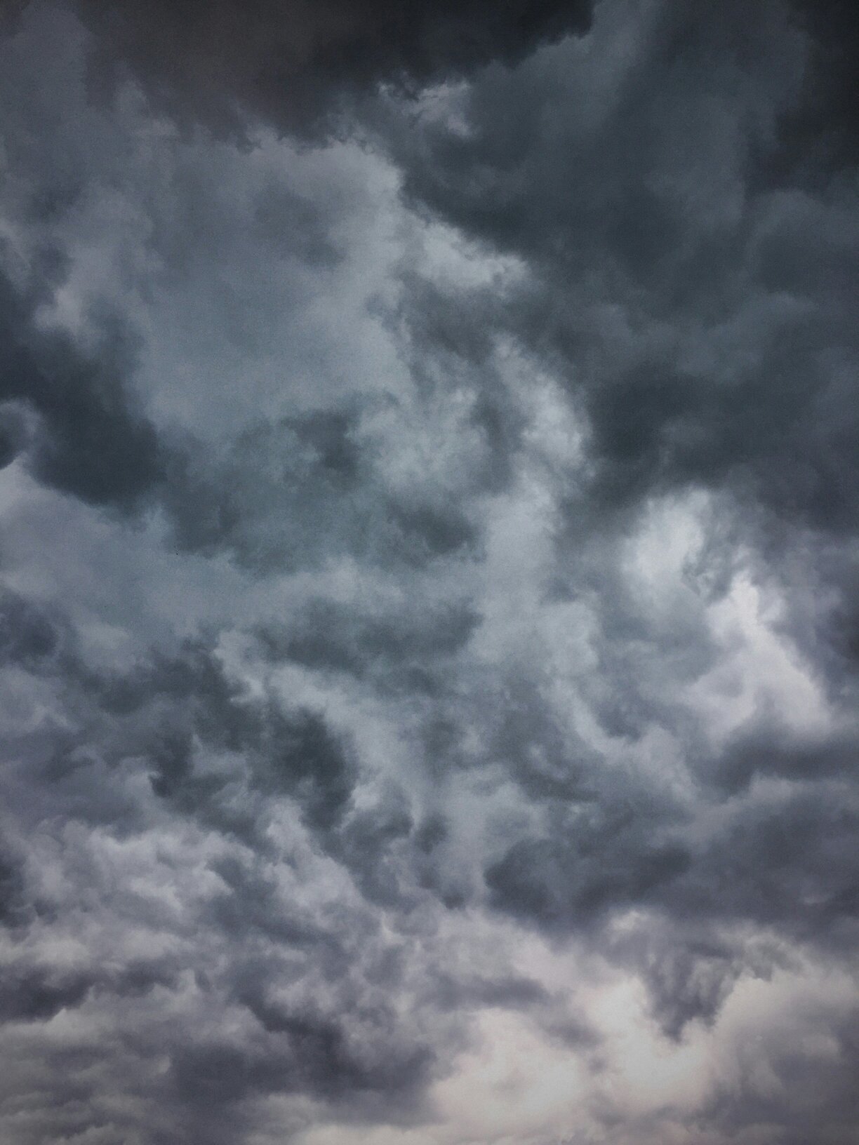 An image of a grey, dark stormy sky